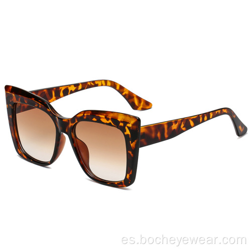 Tendencia de la moda europea y americana Gafas de sol de ojo de gato con montura grande Gafas de sol RETRO de color que cambian gradualmente para mujer sam